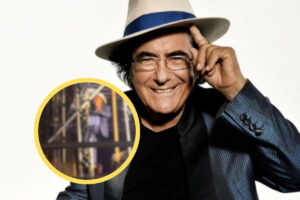 Al Bano, con una cornice con immagine sfocata all'interno